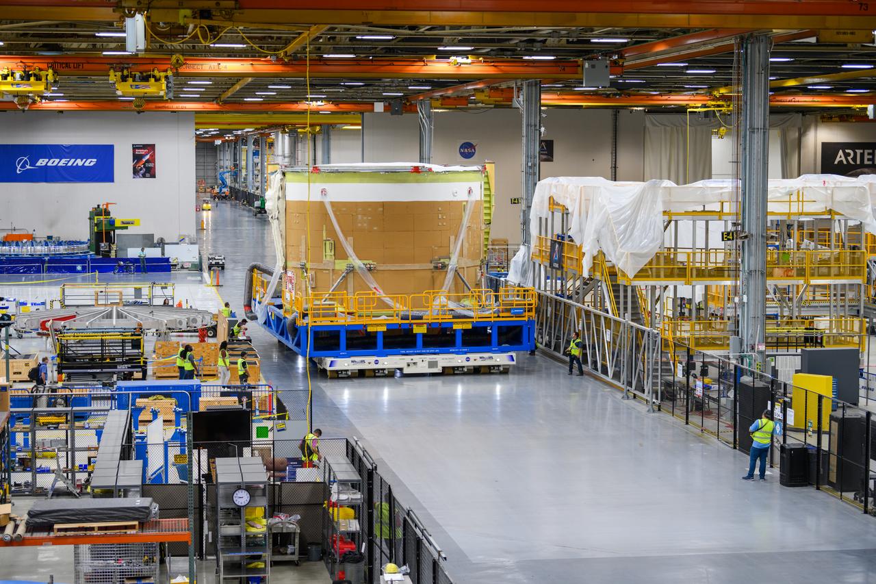 On May 24, 2022, the core stage production team moved the Space Launch System (SLS) rocket engine section for Artemis II to the core stage final integration area at NASA’s Michoud Assembly Facility in New Orleans.  While there, the engine section team is completing installation of the main propulsion systems, finishing integration of the electrical and avionics systems, and preparing for functional testing of the various systems. During final integration, the team also will install remaining internal thermal protection systems and prepare to position the engine section from vertical to horizontal so that it can be joined with the rest of the core stage. The engine section is located at the bottom of the core stage and includes the rocket’s main propulsion systems that connect to the core stage’s four RS-25 engines that will help launch the Artemis II lunar mission. This fall, the engine section will be horizontally integrated with the previously-joined forward assembly and liquid hydrogen tank to complete the core stage. NASA and core stage lead contractor Boeing are building core stages for the next three Artemis missions.  The 212-foot core stage with its RS-25 engines will provide more than 2 million pounds of thrust at launch. With Artemis, NASA will land the first woman and the first person of color on the Moon and establish long-term exploration in preparation for missions to Mars. SLS and NASA’s Orion spacecraft, along with the commercial human landing system and the Gateway in orbit around the Moon, are NASA’s backbone for deep space exploration. SLS is the only rocket that can send Orion, astronauts, and supplies to the Moon in a single mission.