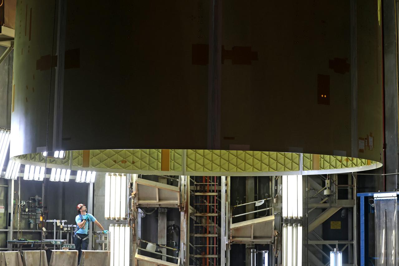 Technicians at NASA’s Michoud Assembly Facility move the engine section of NASA’s Space Launch System rocket for Artemis IV from the Vertical Assembly Building to Cell G for weld priming. This hardware is the first large piece manufactured for the Artemis IV mission and makes up the lowest portion of the 212-foot-tall core stage. When complete, the engine section will house the four RS-25 engines and include vital systems for mounting, controlling and delivering fuel from the propellant tanks to the rocket’s engines. Together with its four RS-25 engines and its twin solid rocket boosters, it will produce 8.8 million pounds of thrust to send NASA’s Orion spacecraft, astronauts, and supplies beyond Earth’s orbit to the Moon and, ultimately, Mars. Offering more payload mass, volume capability, and energy to speed missions through space, the SLS rocket, along with NASA’s Gateway in lunar orbit, the Human Landing System, and Orion spacecraft, is part of NASA’s backbone for deep space exploration and the Artemis lunar program. No other rocket is capable of carrying astronauts in Orion around the Moon in a single mission. Image credit: NASA/Michael DeMocker