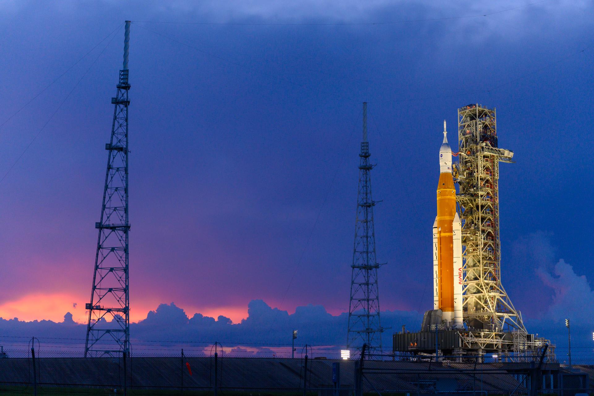 NASA’s Space Launch System (SLS) rocket with the Orion spacecraft aboard is seen atop the mobile launcher at Launch 39B at NASA’s Kennedy Space Center in Florida. Artemis I mission is the first integrated test of the agency’s deep space exploration systems: the Space Launch System rocket, Orion spacecraft, and supporting ground systems. The mission is the first in a series of increasingly complex missions to the Moon. Launch of the uncrewed flight test is targeted for no earlier than Sept. 3 at 2:17 p.m. ET. With Artemis missions, NASA will land the first woman and first person of color on the Moon, using innovative technologies to explore more of the lunar surface than ever before.