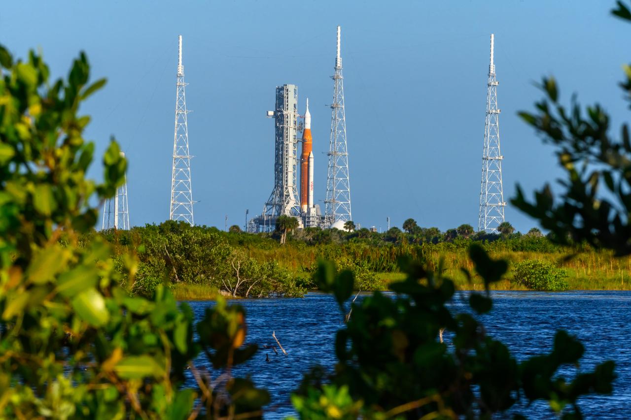 NASA’s Space Launch System (SLS) rocket with the Orion spacecraft aboard is seen atop the mobile launcher at Launch 39B at NASA’s Kennedy Space Center in Florida. Artemis I mission is the first integrated test of the agency’s deep space exploration systems: the Space Launch System rocket, Orion spacecraft, and supporting ground systems. The mission is the first in a series of increasingly complex missions to the Moon. Launch of the uncrewed flight test is targeted for no earlier than Sept. 3 at 2:17 p.m. ET. With Artemis missions, NASA will land the first woman and first person of color on the Moon, using innovative technologies to explore more of the lunar surface than ever before.
