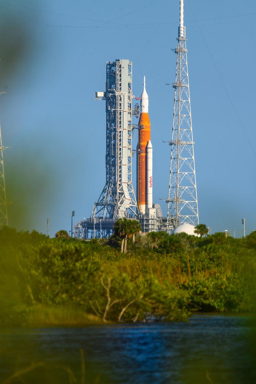 NASA’s Space Launch System (SLS) rocket with the Orion spacecraft aboard is seen atop the mobile launcher at Launch 39B at NASA’s Kennedy Space Center in Florida. Artemis I mission is the first integrated test of the agency’s deep space exploration systems: the Space Launch System rocket, Orion spacecraft, and supporting ground systems. The mission is the first in a series of increasingly complex missions to the Moon. Launch of the uncrewed flight test is targeted for no earlier than Sept. 3 at 2:17 p.m. ET. With Artemis missions, NASA will land the first woman and first person of color on the Moon, using innovative technologies to explore more of the lunar surface than ever before.
