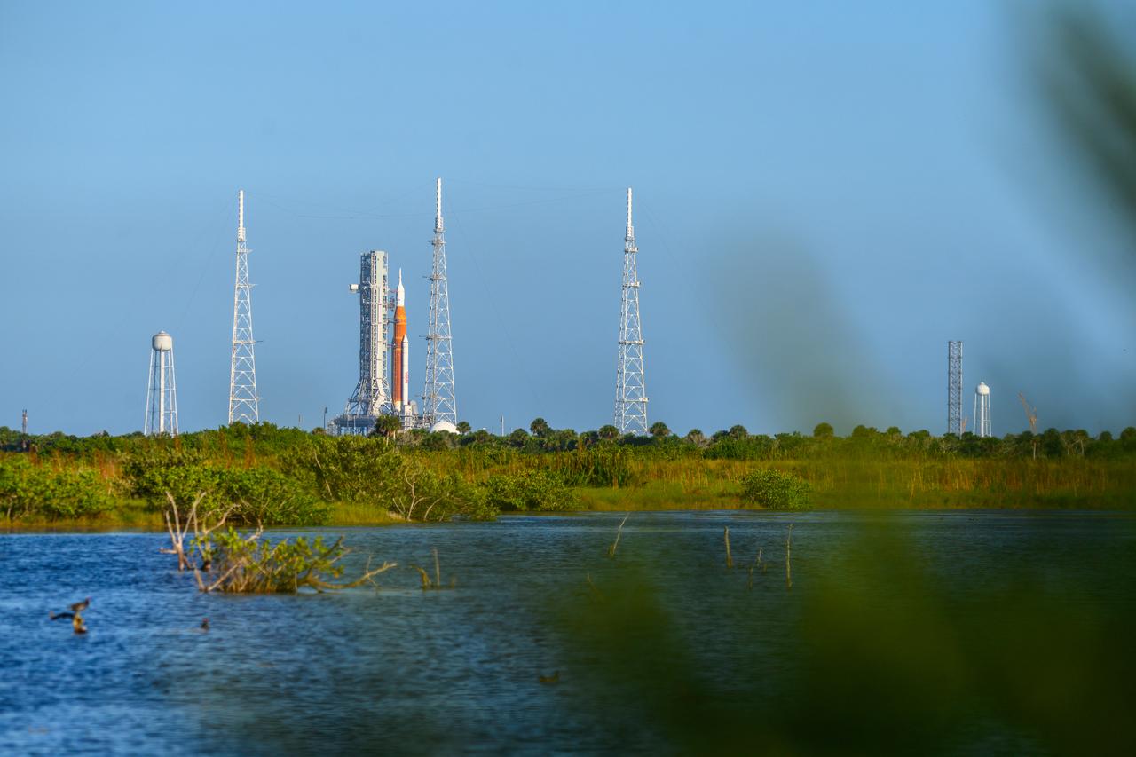 NASA’s Space Launch System (SLS) rocket with the Orion spacecraft aboard is seen atop the mobile launcher at Launch 39B at NASA’s Kennedy Space Center in Florida. Artemis I mission is the first integrated test of the agency’s deep space exploration systems: the Space Launch System rocket, Orion spacecraft, and supporting ground systems. The mission is the first in a series of increasingly complex missions to the Moon. Launch of the uncrewed flight test is targeted for no earlier than Sept. 3 at 2:17 p.m. ET. With Artemis missions, NASA will land the first woman and first person of color on the Moon, using innovative technologies to explore more of the lunar surface than ever before.