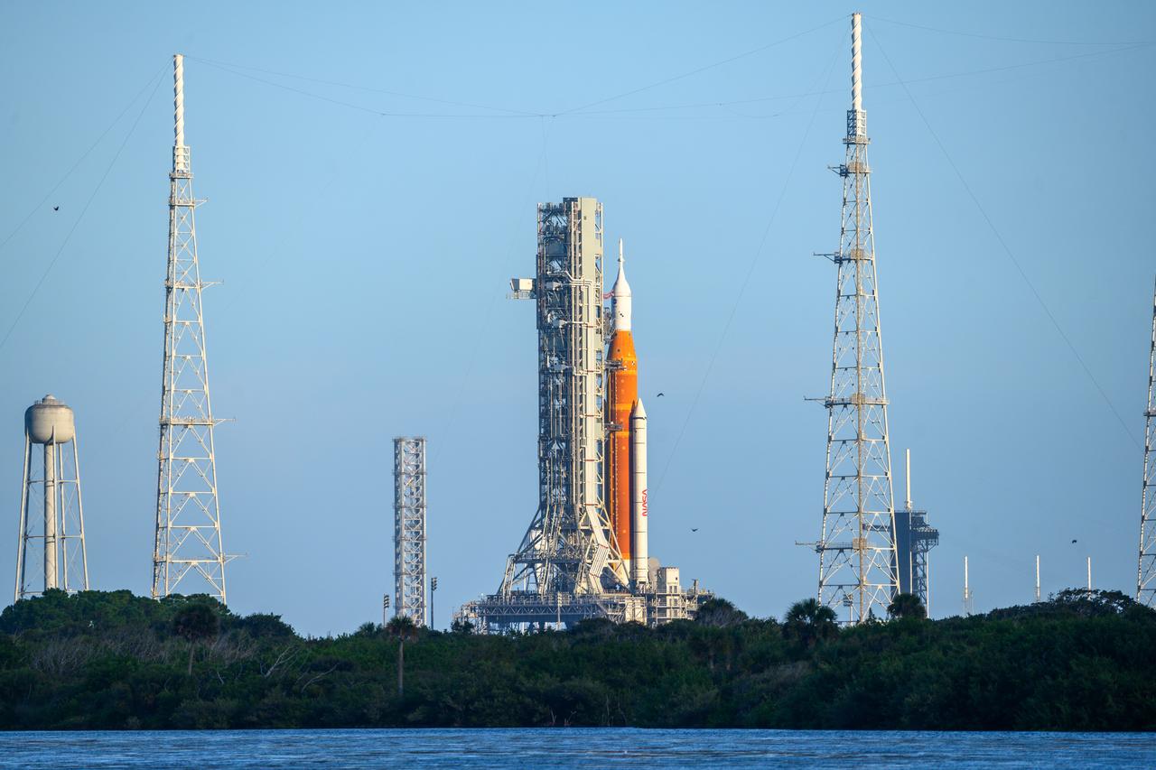 NASA’s Space Launch System (SLS) rocket with the Orion spacecraft aboard is seen atop the mobile launcher at Launch 39B at NASA’s Kennedy Space Center in Florida. Artemis I mission is the first integrated test of the agency’s deep space exploration systems: the Space Launch System rocket, Orion spacecraft, and supporting ground systems. The mission is the first in a series of increasingly complex missions to the Moon. Launch of the uncrewed flight test is targeted for no earlier than Sept. 3 at 2:17 p.m. ET. With Artemis missions, NASA will land the first woman and first person of color on the Moon, using innovative technologies to explore more of the lunar surface than ever before.