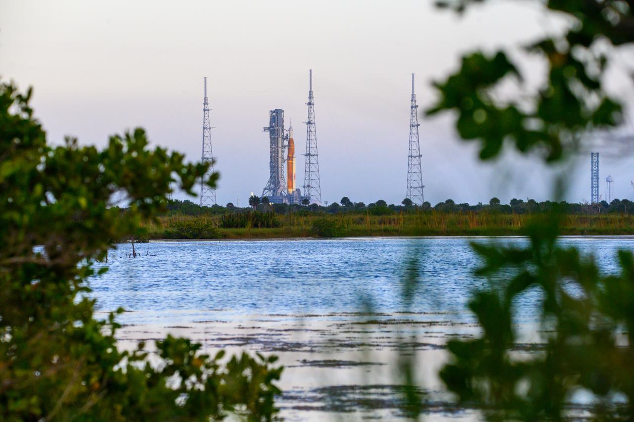 NASA’s Space Launch System (SLS) rocket with the Orion spacecraft aboard is seen atop the mobile launcher at Launch 39B at NASA’s Kennedy Space Center in Florida. Artemis I mission is the first integrated test of the agency’s deep space exploration systems: the Space Launch System rocket, Orion spacecraft, and supporting ground systems. The mission is the first in a series of increasingly complex missions to the Moon. Launch of the uncrewed flight test is targeted for no earlier than Sept. 3 at 2:17 p.m. ET. With Artemis missions, NASA will land the first woman and first person of color on the Moon, using innovative technologies to explore more of the lunar surface than ever before.