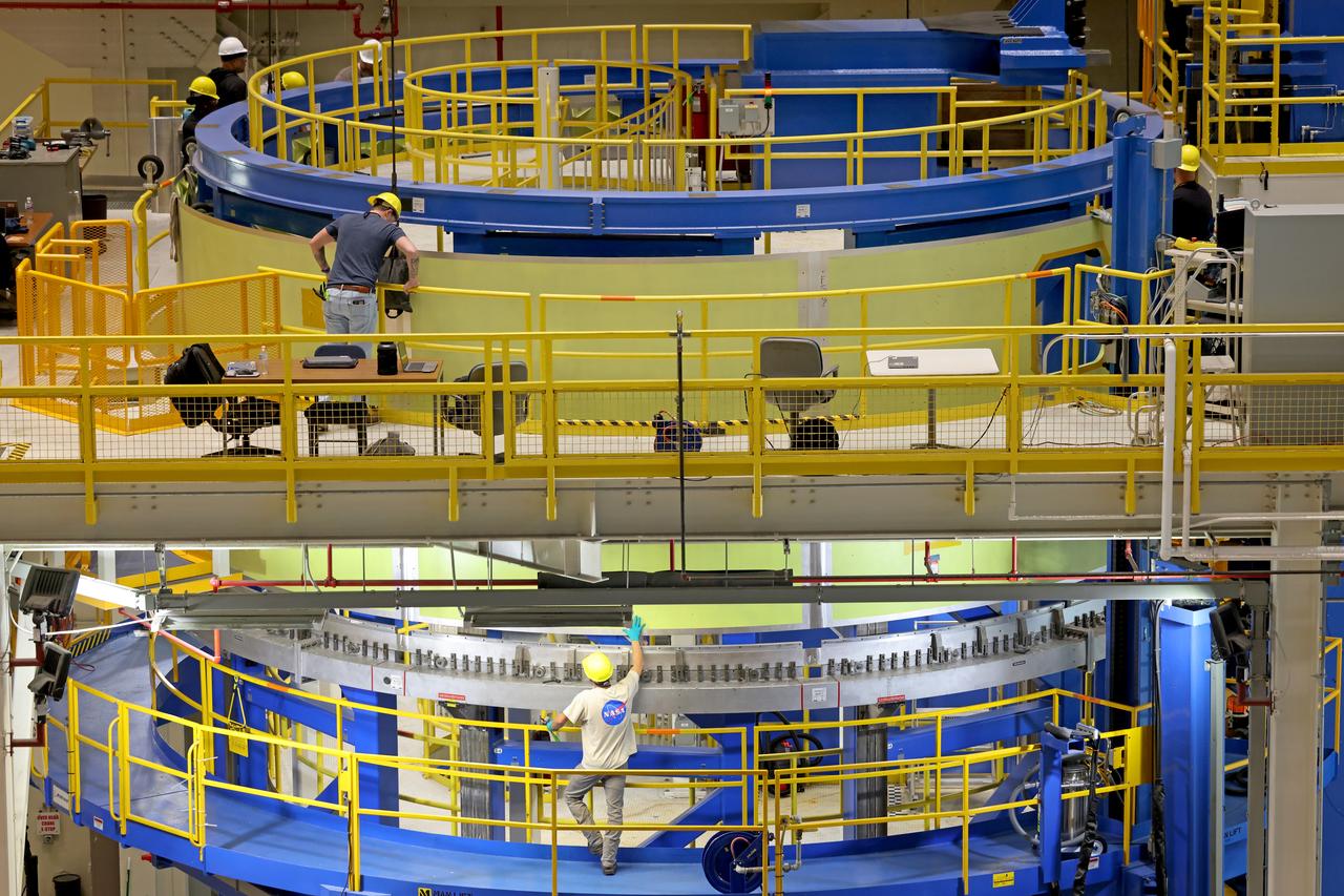 Crews at NASA’s Michoud Assembly Facility in New Orleans lift the forward skirt of a core stage that will power NASA’s Space Launch System (SLS) rocket out of the Vertical Weld Center Sept. 16, 2022. The forward skirt will be used for NASA’s Artemis IV mission. The hardware houses flight computers, cameras, and avionics systems for the SLS rocket. The SLS core stage is made up of five unique elements: the forward skirt, liquid oxygen tank, intertank, liquid hydrogen tank, and the engine section. When fully stacked, the forward skirt is located at the top of the 212-foot-tall core stage and connects to the upper part of the rocket. The core stage and its four RS-25 engines provide more than 2 million pounds of thrust to help power NASA’s next-generation lunar missions. Image credit: NASA/Michael DeMocker 