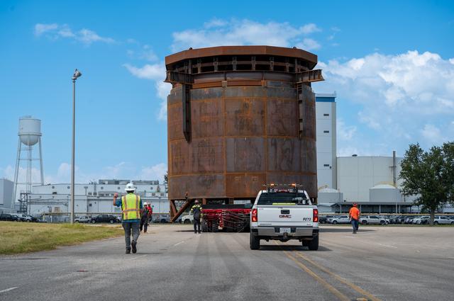 Inter-Stage Simulator for Exploration Upper Stage Moves to Michoud Dock for Transport