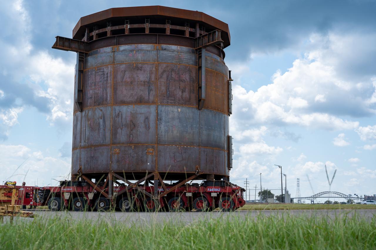 Move crews at NASA’s Michoud Assembly Facility in New Orleans guide the Inter-Stage Simulator (ISS) to the Michoud deep water port on Monday, Sept. 19 in preparation for transportation by barge to the agency’s Stennis Space Center near Bay St. Louis, Mississippi.  Once it arrives at Stennis, the simulator will be lifted into the B2 Test Stand, where it holds the Exploration Upper Stage (EUS) in place and acts as a thrust takeout. ISS protects the lower portion of the EUS from environmental elements during its Green Run tests. The term “green” refers to the new hardware, and “run” refers to operation all the components together for the first time. During tanking and launch for its future mission, the lower portion is shrouded in a flight interstage. EUS is part of the SLS Block 1B configuration. The more powerful configuration of the SLS rocket will provide in-space propulsion to send astronauts in NASA’s Orion spacecraft and 40% more cargo mass on a precise trajectory to the Moon. Through the Artemis missions, NASA will land the first woman and the first person of color on the Moon to pave the way for a sustainable presence on the Moon and future missions beyond.