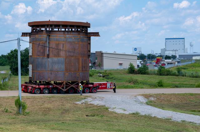 Inter-Stage Simulator for Exploration Upper Stage Moves to Michoud Dock for Transport