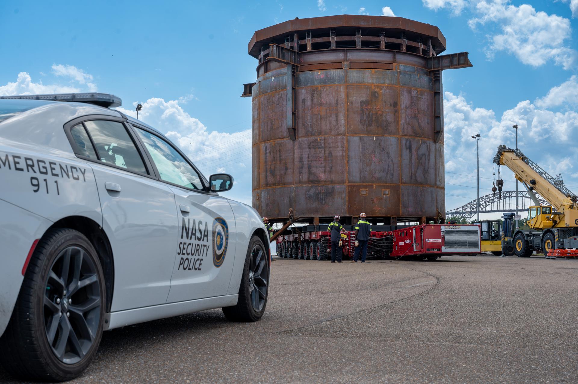 Move crews at NASA’s Michoud Assembly Facility in New Orleans guide the Inter-Stage Simulator (ISS) to the Michoud deep water port on Monday, Sept. 19 in preparation for transportation by barge to the agency’s Stennis Space Center near Bay St. Louis, Mississippi. Crews will lift the simulator into the B2 Test Stand at Stennis, where it holds the Exploration Upper Stage (EUS) in place and acts as a thrust takeout. ISS protects the lower portion of the EUS from environmental elements during its Green Run tests. The term “green” refers to the new hardware, and “run” refers to operation all the components together for the first time. During tanking and launch for its future mission, the lower portion is shrouded in a flight interstage. EUS is part of the SLS Block 1B configuration. The more powerful configuration of the SLS rocket will provide in-space propulsion to send astronauts in NASA’s Orion spacecraft and 40% more cargo mass on a precise trajectory to the Moon. Through the Artemis missions, NASA will land the first woman and the first person of color on the Moon to pave the way for a sustainable presence on the Moon and future missions beyond.