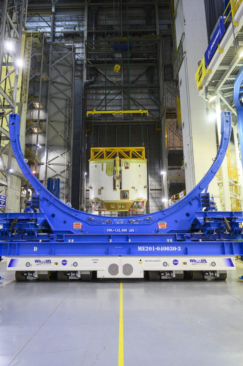 Technicians at NASA’s Michoud Assembly Facility in New Orleans flipped the engine section of NASA’s Space Launch System rocket for Artemis II from a vertical to a horizontal position Feb. 11. The flip, also known as a breakover, is in preparation for the final assembly and integration into the core stage for the second SLS rocket. The engine section is the bottom-most portion of the 212-foot-tall core stage and is one of the most complex and intricate portions of the rocket that will help power the first crewed Artemis mission to the Moon. It is the last of five elements that is needed to join the stage as one structure. In addition to its miles of cabling and hundreds of sensors, the engine section is a crucial attachment point for the four RS-25 engines and two solid rocket boosters that produce a combined 8.8 million pounds of thrust at liftoff and flight.  Next, teams will move the engine section into the final assembly area where they will complete the join. After the join is complete, teams will begin to add each of the four RS-25 engines. The completely assembled stage with its four RS-25 engines will be shipped to NASA’s Kennedy Space Center in Florida later this year. The SLS rocket is the only rocket capable of carrying astronauts in Orion around the Moon in a single mission. Image credit: NASA/Eric Bordelon