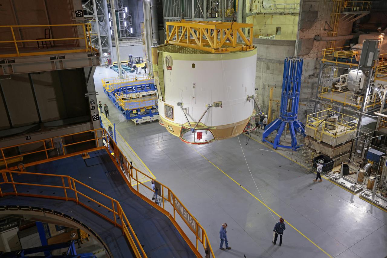 Technicians at NASA’s Michoud Assembly Facility in New Orleans flipped the engine section of NASA’s Space Launch System rocket for Artemis II from a vertical to a horizontal position Feb. 11. The flip, also known as a breakover, is in preparation for the final assembly and integration into the core stage for the second SLS rocket. The engine section is the bottom-most portion of the 212-foot-tall core stage and is one of the most complex and intricate portions of the rocket that will help power the first crewed Artemis mission to the Moon. It is the last of five elements that is needed to join the stage as one structure. In addition to its miles of cabling and hundreds of sensors, the engine section is a crucial attachment point for the four RS-25 engines and two solid rocket boosters that produce a combined 8.8 million pounds of thrust at liftoff and flight.  Next, teams will move the engine section into the final assembly area where they will complete the join. After the join is complete, teams will begin to add each of the four RS-25 engines. The completely assembled stage with its four RS-25 engines will be shipped to NASA’s Kennedy Space Center in Florida later this year. The SLS rocket is the only rocket capable of carrying astronauts in Orion around the Moon in a single mission. Image credit: NASA/Michael DeMocker