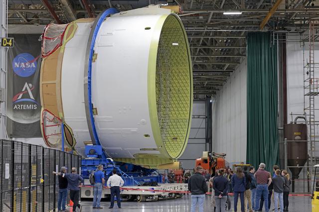 NASA image: Teams Move Artemis II SLS Engine Section into Position for Final Join