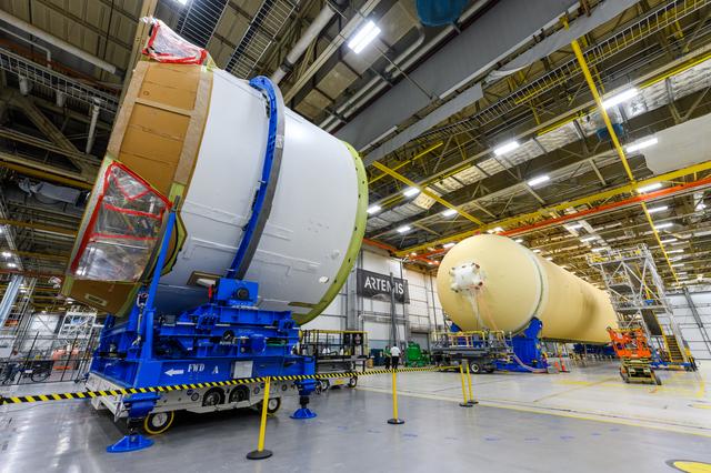 NASA image: Teams Move Artemis II SLS Engine Section into Position for Final Join
