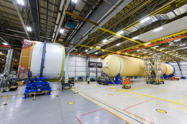 NASA image: Teams Move Artemis II SLS Engine Section into Position for Final Join