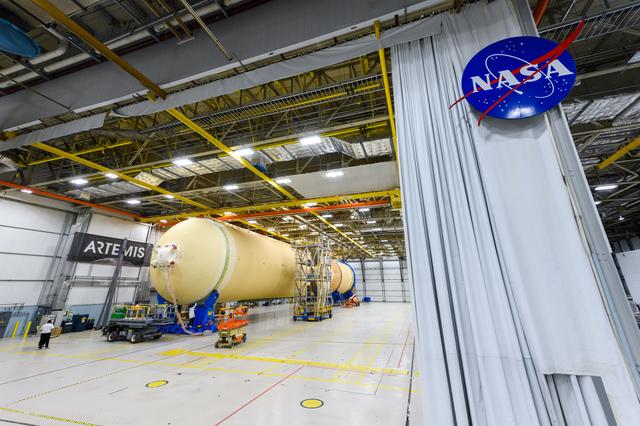 NASA image: Teams Move Artemis II SLS Engine Section into Position for Final Join
