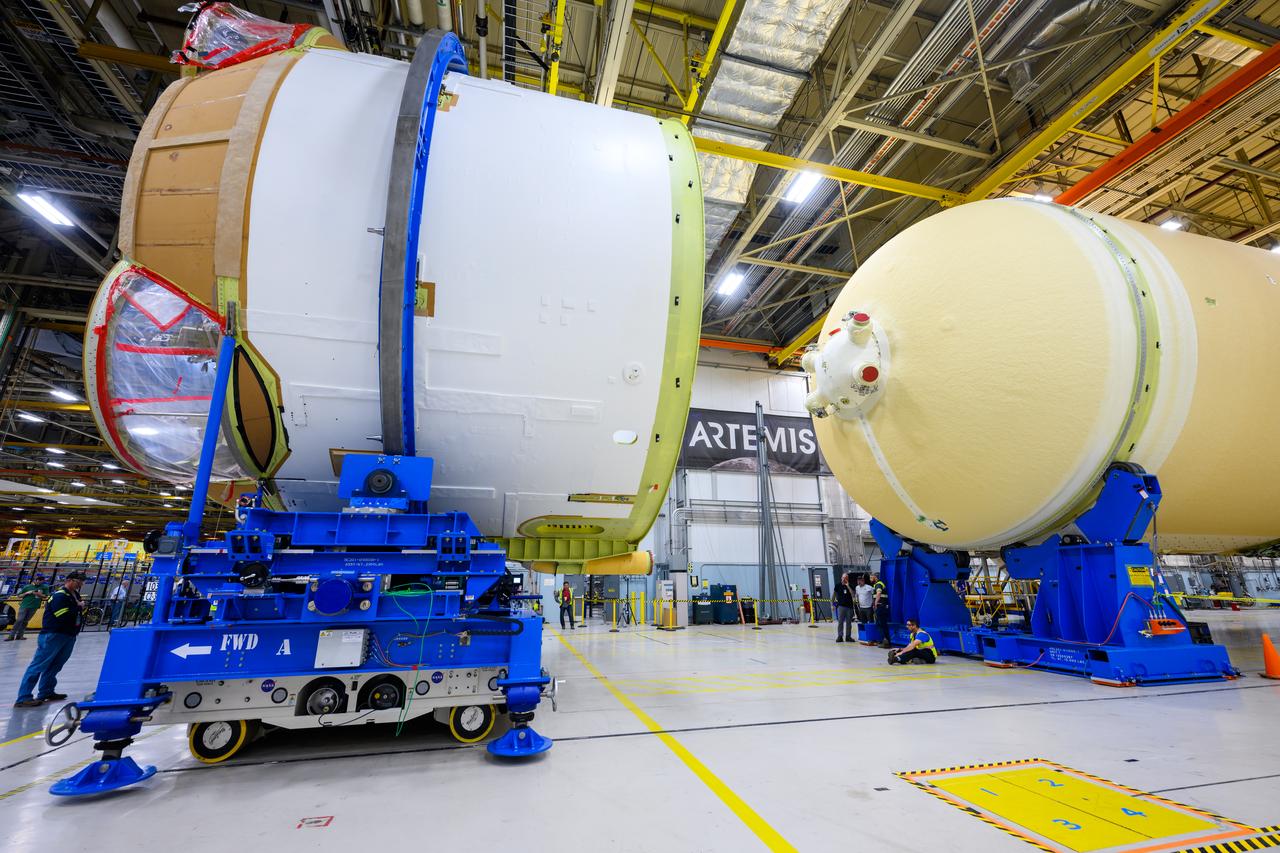 Technicians at NASA’s Michoud Assembly Facility in New Orleans moved the engine section of NASA’s Space Launch System (SLS) rocket for Artemis II, the first crewed mission to the Moon, into position for the final join of the core stage Feb. 22. The engine section is the bottom-most portion of the 212-foot-tall core stage. It is the last of five major elements that is needed to connect the stage into one major structure. In addition to its miles of cabling and hundreds of sensors, the engine section is a crucial attachment point for the four RS-25 engines and two solid rocket boosters that produce a combined 8.8 million pounds of thrust at liftoff and flight. During launch and flight, liquid propellants from the liquid hydrogen tank and liquid oxygen tanks are delivered through the engine section to the four RS-25 engines. The engine section also includes the avionics that help steer the engines after liftoff.   Next, teams will join the engine section to the core stage for the second SLS rocket. After the join is complete, teams will begin to add each of the four RS-25 engines one by one to complete the stage. The completely assembled stage with its four RS-25 engines will be shipped to NASA’s Kennedy Space Center in Florida later this year. The SLS rocket is the only rocket capable of carrying astronauts in Orion around the Moon in a single mission.  