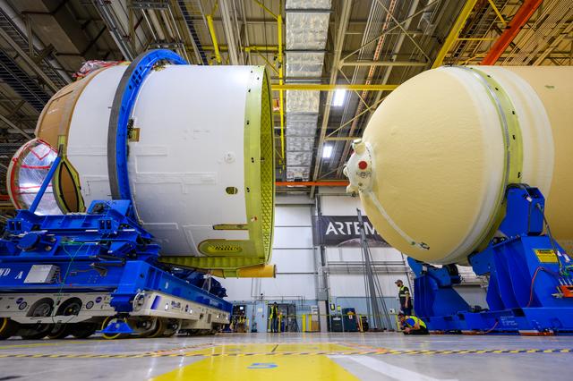 NASA image: Teams Move Artemis II SLS Engine Section into Position for Final Join