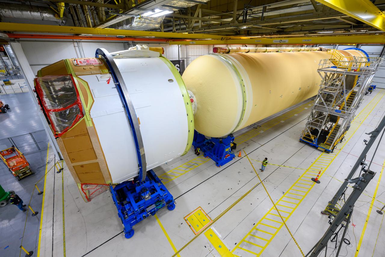 Technicians at NASA’s Michoud Assembly Facility in New Orleans moved the engine section of NASA’s Space Launch System (SLS) rocket for Artemis II, the first crewed mission to the Moon, into position for the final join of the core stage Feb. 22. The engine section is the bottom-most portion of the 212-foot-tall core stage. It is the last of five major elements that is needed to connect the stage into one major structure. In addition to its miles of cabling and hundreds of sensors, the engine section is a crucial attachment point for the four RS-25 engines and two solid rocket boosters that produce a combined 8.8 million pounds of thrust at liftoff and flight. During launch and flight, liquid propellants from the liquid hydrogen tank and liquid oxygen tanks are delivered through the engine section to the four RS-25 engines. The engine section also includes the avionics that help steer the engines after liftoff.   Next, teams will join the engine section to the core stage for the second SLS rocket. After the join is complete, teams will begin to add each of the four RS-25 engines one by one to complete the stage. The completely assembled stage with its four RS-25 engines will be shipped to NASA’s Kennedy Space Center in Florida later this year. The SLS rocket is the only rocket capable of carrying astronauts in Orion around the Moon in a single mission.  