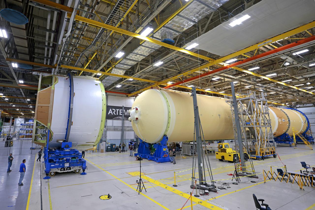 Teams with NASA and Boeing, the core stage lead contractor, at NASA’s Michoud Assembly Facility in New Orleans have fully integrated all five major structures of the Space Launch System (SLS) rocket’s core stage for Artemis II, the first Artemis mission that will send four astronauts around the Moon and return them home. Technicians joined the engine section to the rest of the rocket stage March 17. Next, teams will integrate the four RS-25 engines to the engine section to complete the stage. Located at the bottom of the 212-foot-tall core stage, the engine section is the most complex and intricate part of the rocket stage, helping to power Artemis missions to the Moon. In addition to its miles of cabling and hundreds of sensors, the engine section is a crucial attachment point for the RS-25 engines and two solid rocket boosters that produce a combined 8.8 million pounds of thrust at liftoff. It houses the engines and includes vital systems for mounting, controlling, and delivering fuel from the propellant tanks to the engines. Image credit: NASA/Michael DeMocker