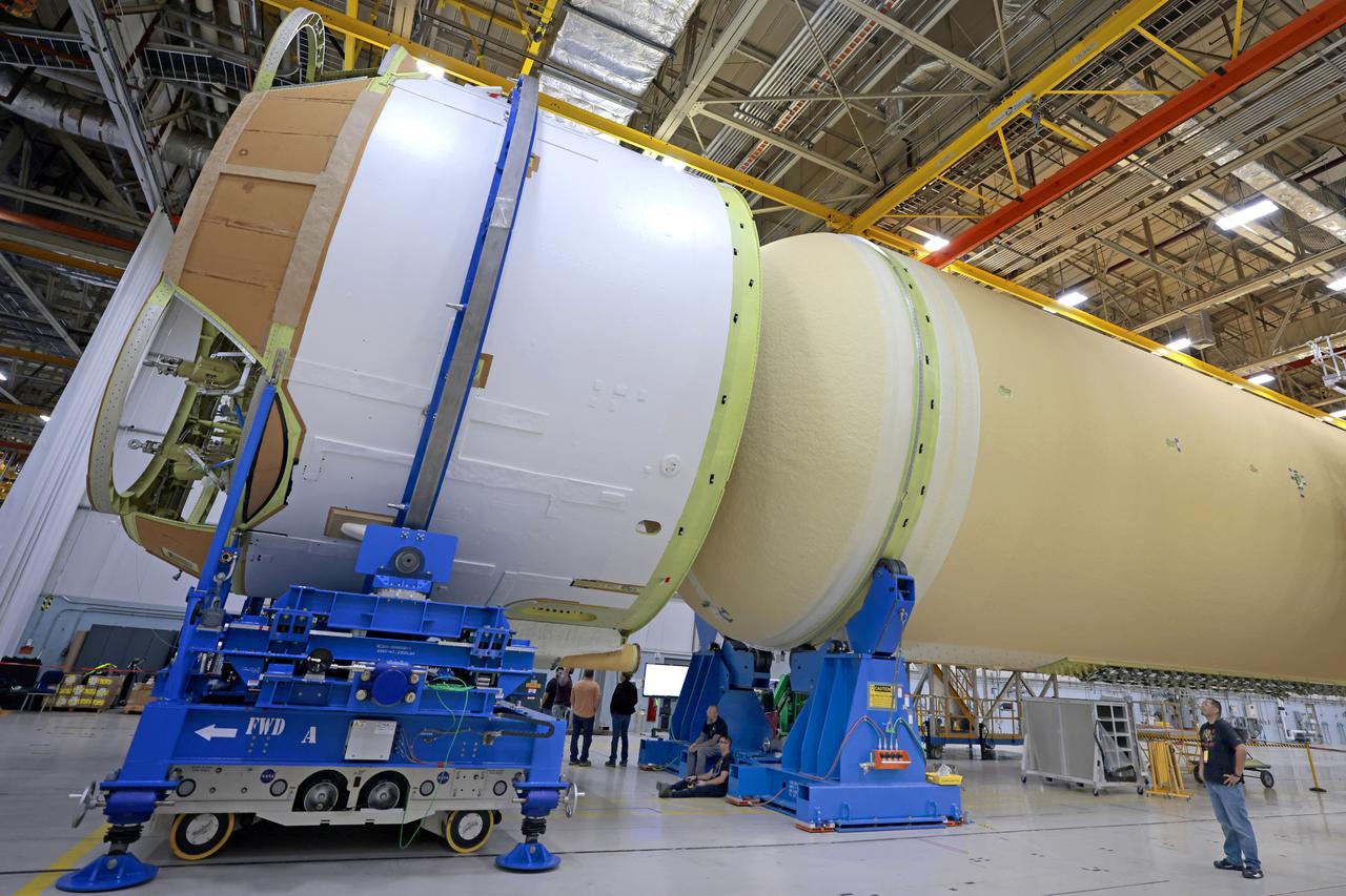 Teams with NASA and Boeing, the core stage lead contractor, at NASA’s Michoud Assembly Facility in New Orleans have fully integrated all five major structures of the Space Launch System (SLS) rocket’s core stage for Artemis II, the first Artemis mission that will send four astronauts around the Moon and return them home. Technicians joined the engine section to the rest of the rocket stage March 17. Next, teams will integrate the four RS-25 engines to the engine section to complete the stage. Located at the bottom of the 212-foot-tall core stage, the engine section is the most complex and intricate part of the rocket stage, helping to power Artemis missions to the Moon. In addition to its miles of cabling and hundreds of sensors, the engine section is a crucial attachment point for the RS-25 engines and two solid rocket boosters that produce a combined 8.8 million pounds of thrust at liftoff. It houses the engines and includes vital systems for mounting, controlling, and delivering fuel from the propellant tanks to the engines. Image credit: NASA/Michael DeMocker