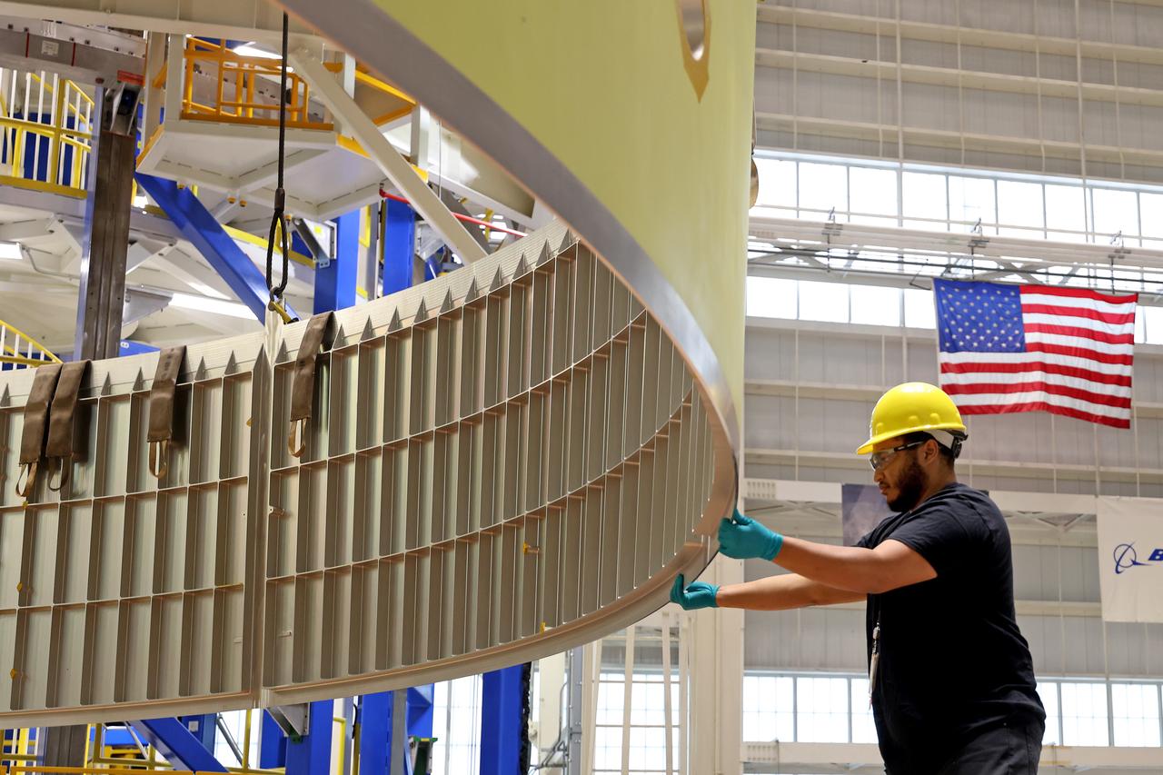 These images and videos show technicians at NASA’s Michoud Assembly Facility in New Orleans examining and lifting midbody barrels for the Exploration Upper Stage (EUS) structural test article of the SLS (Space Launch System) rocket in May 2023. The barrel sections make up the body, or main structure, of the future in-space propulsion stage for the mega rocket. The Exploration Upper Stage will be used on the second configuration of the SLS rocket, known as Block 1B, and will provide in-space propulsion to send astronauts in NASA’s Orion spacecraft and heavy cargo on a precise trajectory to the Moon. Beginning with Artemis IV, EUS will replace the interim cryogenic propulsion stage for the Block 1 configuration of SLS. It has larger propellant tanks and four RL10 engines, enabling SLS to launch 40% more cargo to the Moon along with crew.  EUS flight hardware is in early production at Michoud. Crews with NASA and Boeing, the lead contractor for the SLS core stage and EUS, are also manufacturing the EUS structural test article. The test hardware is structurally identical to the flight version and will be used during a series of strenuous testing that simulates the forces the rocket will experience during launch and flight and verify its structural integrity.   NASA is working to land the first woman and first person of color on the Moon under Artemis. SLS is part of NASA’s backbone for deep space exploration, along with Orion and the Gateway in orbit around the Moon. SLS is the only rocket that can send Orion, astronauts, and supplies to the Moon in a single mission. 