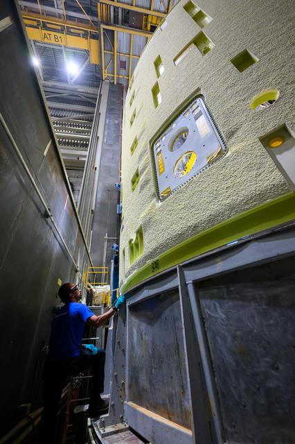 NASA image: Technicians Lift, Prepare Artemis III SLS Intertank for Next Phase of Production at NASA Michoud