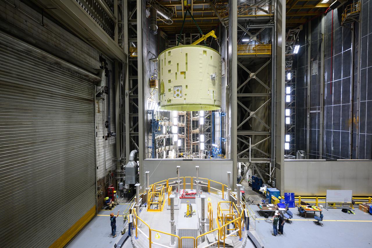 Technicians at NASA’s Michoud Assembly Facility in New Orleans lift the intertank of the SLS (Space Launch System)’s core stage for NASA’s Artemis III mission to move it to another location in the 43-acre factory for further inspection and production.   The intertank is the backbone of the rocket’s core stage and is located between the mega rocket’s liquid hydrogen tank and liquid oxygen tank. In addition to joining the rocket’s two massive propellant tanks, the intertank houses avionics and electronics and serves as an attachment point for the rocket’s two solid rocket boosters positioned on either side of the core stage. The liquid hydrogen tank and liquid oxygen tank hold 733,000 gallons of super-cold propellant to power the stage’s four RS-25 engines needed for liftoff. Together, the rocket’s four RS-25 engines and two solid rocket boosters provide more than 8.8 million pounds to launch NASA’s and Artemis missions to the Moon. NASA is working to land the first woman and first person of color on the Moon under Artemis. SLS is part of NASA’s backbone for deep space exploration, along with Orion and the Gateway in orbit around the Moon. SLS is the only rocket that can send Orion, astronauts, and supplies to the Moon in a single mission. 