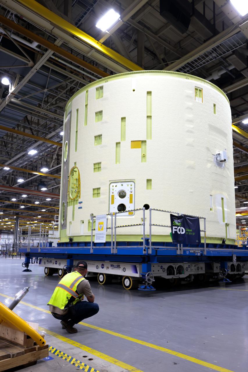 Technicians at NASA’s Michoud Assembly Facility in New Orleans lift the intertank of the SLS (Space Launch System)’s core stage for NASA’s Artemis III mission to move it to another location in the 43-acre factory for further inspection and production.   The intertank is the backbone of the rocket’s core stage and is located between the mega rocket’s liquid hydrogen tank and liquid oxygen tank. In addition to joining the rocket’s two massive propellant tanks, the intertank houses avionics and electronics and serves as an attachment point for the rocket’s two solid rocket boosters positioned on either side of the core stage. The liquid hydrogen tank and liquid oxygen tank hold 733,000 gallons of super-cold propellant to power the stage’s four RS-25 engines needed for liftoff. Together, the rocket’s four RS-25 engines and two solid rocket boosters provide more than 8.8 million pounds to launch NASA’s and Artemis missions to the Moon. NASA is working to land the first woman and first person of color on the Moon under Artemis. SLS is part of NASA’s backbone for deep space exploration, along with Orion and the Gateway in orbit around the Moon. SLS is the only rocket that can send Orion, astronauts, and supplies to the Moon in a single mission. 