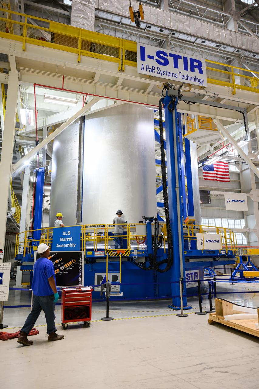 Crews at NASA’s Michoud Assembly Facility in New Orleans load alluminum alloy panels into the Vertical Weld Center June 1. The Vertical Weld Center is a friction-stir weld tool for the large structures of the core stage for the SLS (Space Launch System) rocket. Teams load the panels into the VWC  using an overhead crane system, then multiple panels are welded together to create entire barrels. The panels in these images are some of the five barrels that will form the SLS liquid hydrogen propellant tank for the SLS rocket that will power NASA’s Artemis IV mission, which is also the first flight of SLS in its more powerful Block 1B configuration. The SLS core stage is made up of five unique elements: the forward skirt, liquid oxygen tank, intertank, liquid hydrogen tank, and the engine section. The liquid hydrogen propellant tank holds 537,000 gallons of liquid hydrogen cooled to minus 432 degrees Fahrenheit and sits between the core stage’s intertank and engine section. The liquid hydrogen hardware, along with the liquid oxygen tank, provides propellant to the four RS-25 engines at the bottom of the core stage to produce more than two million pounds of thrust to help launch the Artemis IV mission to the Moon. Together with its four RS-25 engines, the rocket’s massive 212-foot-tall core stage — the largest stage NASA has ever built — and its twin solid rocket boosters produce 8.8 million pounds of thrust to send NASA’s Orion spacecraft, astronauts and supplies beyond Earth’s orbit to the Moon. NASA is working to land the first woman and first person of color on the Moon under Artemis. SLS is part of NASA’s backbone for deep space exploration, along with Orion and the Gateway in orbit around the Moon. SLS is the only rocket that can send Orion, astronauts, and supplies to the Moon in a single mission. 