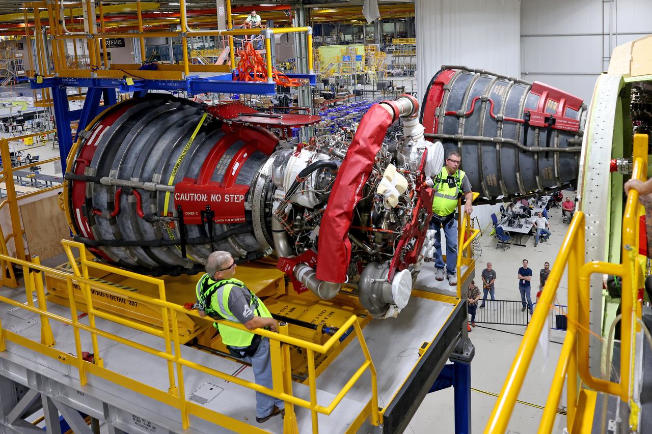 These photos and videos show how technicians at NASA’s Michoud Assembly Facility in New Orleans installed the second of four RS-25 engines onto the core stage for the agency’s SLS (Space Launch System) rocket that will help power NASA’s first crewed Artemis mission to the Moon.   Crews added the second engine, with the serial number E2047 in position one, to the stage Sept. 15. The serial number for the engine installed Sept. 11 in position two on the core stage is E2059. Engineers consider the engines to be “soft” mated to the rocket stage. Following soft mate of all four engines, technicians with NASA, Aerojet Rocketdyne, an L3Harris Technologies company and the RS-25 engines lead contractor, along with Boeing, the core stage lead contractor, will fully secure the engines to the stage and integrate the propulsion and electrical systems within the structure. All four RS-25 engines are located at the base of the core stage within the engine section.  NASA is working to land the first woman and first person of color on the Moon under Artemis. SLS is part of NASA’s backbone for deep space exploration, along with Orion and the Gateway in orbit around the Moon. SLS is the only rocket that can send Orion, astronauts, and supplies to the Moon in a single mission. 