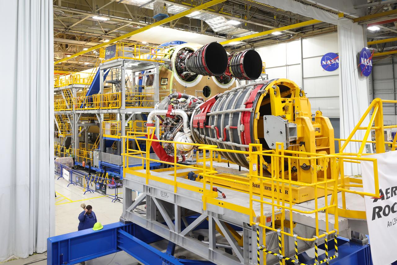 These photos and videos show how technicians at NASA’s Michoud Assembly Facility in New Orleans installed the third and fourth RS-25 engines onto the core stage for the agency’s SLS (Space Launch System) rocket that will help power NASA’s first crewed Artemis mission to the Moon.   Technicians added the first engine to the SLS core stage Sept. 11. The second engine was installed onto the stage Sept. 15 with the third and fourth engines following Sept. 19 and Sept. 20. Engineers consider the engines to be “soft” mated to the rocket stage. Technicians with NASA, Aerojet Rocketdyne, an L3Harris Technologies company and the RS-25 engines lead contractor, along with Boeing, the core stage lead contractor, will now focus efforts on the complex tax of fully securing the engines to the stage and integrating the propulsion and electrical systems within the structure.  NASA is working to land the first woman and first person of color on the Moon under Artemis. SLS is part of NASA’s backbone for deep space exploration, along with Orion and the Gateway in orbit around the Moon. SLS is the only rocket that can send Orion, astronauts, and supplies to the Moon in a single mission.