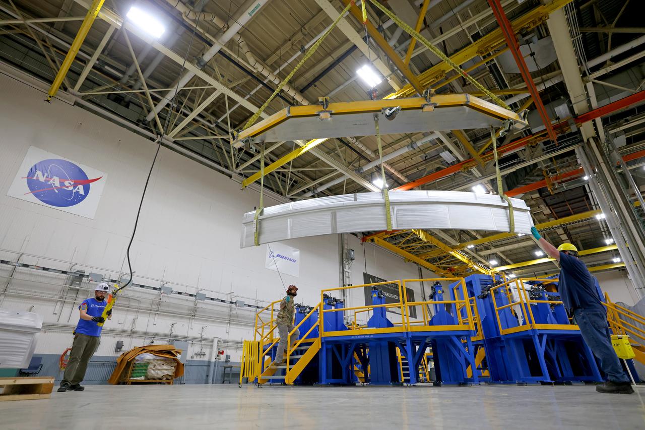 These photos show how teams at NASA’s Michoud Assembly Facility in New Orleans manufactured the Y-ring that will be used on the evolved Block 1B configuration of the SLS (Space Launch System) rocket. It is one of the first components that will make up a portion of the core stage that will power NASA’s Artemis V mission. The large metal ring will serve as the aft ring for the rocket’s liquid hydrogen tank.  The SLS core stage is the backbone of the SLS rocket, stretching 212 feet from top to bottom, and includes four RS-25 engines at its base. At launch, its two huge liquid propellant tanks provide more than 733,000 gallons of fuel to produce more than 2 million pounds of thrust. Michoud Assembly Facility and the SLS Program are managed by NASA’s Marshall Space Flight Center in Huntsville, Alabama. Image credit: NASA/Michael DeMocker