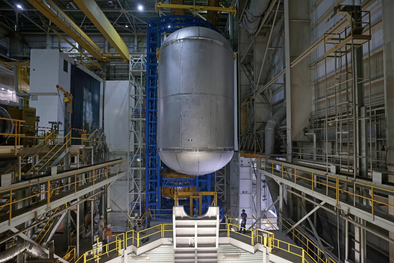 Teams at NASA’s Michoud Assembly Facility in New Orleans successfully completed hydrostatic proof testing of the core stage liquid oxygen tank for the agency’s Artemis III mission. The non-destructive evaluation method tests the structural integrity of the tank’s welds by filling the tank with water, simulating the propellant used during launch. The hardware was then moved to an adjacent cell for internal cleaning.  Next, the tank will be readied for primer and application of its thermal protection system. The propellant tank is one of five major elements that make up the 212-foot-tall rocket stage. The core stage, along with its four RS-25 engines, produce two million pounds of thrust to help launch NASA’s Orion spacecraft, astronauts, and supplies beyond Earth’s orbit and to the lunar surface for Artemis. Image credit: NASA/Michael DeMocker