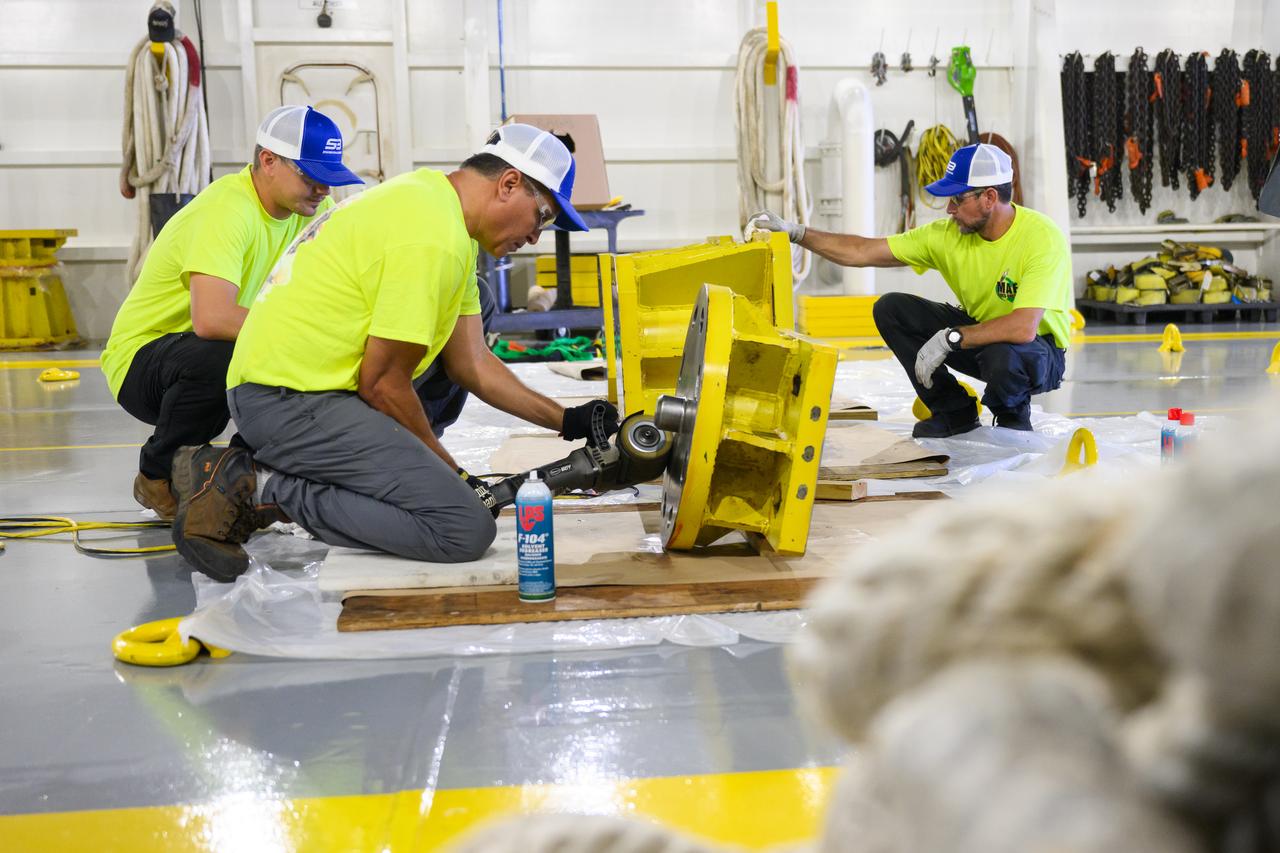 These photos show how team members installed pedestals aboard NASA’s Pegasus barge to hold and secure the massive core stage of NASA’s SLS (Space Launch System) rocket, indicating the barge and its crew are nearly ready for the barge’s first delivery to support the Artemis II test flight around the Moon. The barge will ferry the fully assembled core stage on a 900-mile journey from the agency’s Michoud Assembly Facility in New Orleans to its Kennedy Space Center in Florida. The Pegasus crew began installing the pedestals July 10. Pegasus is maintained at NASA Michoud. The SLS core stage is fully manufactured at Michoud.  NASA is working to land the first woman, first person of color, and its first international partner astronaut on the Moon under Artemis. SLS is part of NASA’s backbone for deep space exploration, along with the Orion spacecraft, supporting ground systems, advanced spacesuits and rovers, the Gateway in orbit around the Moon, and commercial human landing systems. SLS is the only rocket that can send Orion, astronauts, and supplies to the Moon in a single launch.  