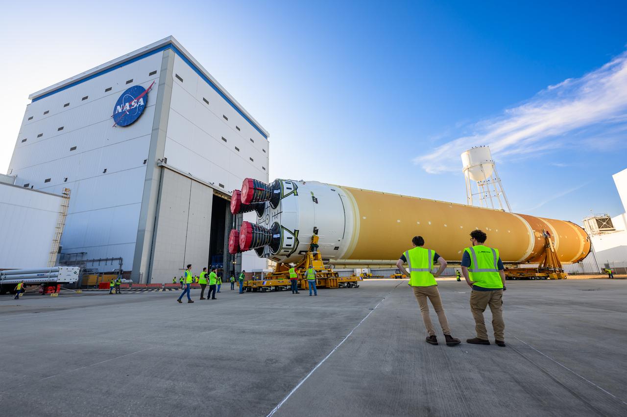 This photo shows NASA and Boeing, the SLS core stage lead contractor, preparing the SLS (Space Launch System) rocket core stage for shipment at NASA’s Michoud Assembly Facility in New Orleans. On July 6, NASA and Boeing moved the Artemis II rocket stage to Building 110. The move comes as teams prepare to roll the massive rocket stage with its four RS-25 engines to the agency’s Pegasus barge for delivery to NASA’s Kennedy Space Center in Florida in mid-July. Prior to the move, technicians began removing external access stands, or scaffolding, surrounding the core stage to assess the interior elements, including its complex avionics and flight propulsion systems. The stage is fully manufactured at NASA Michoud. 