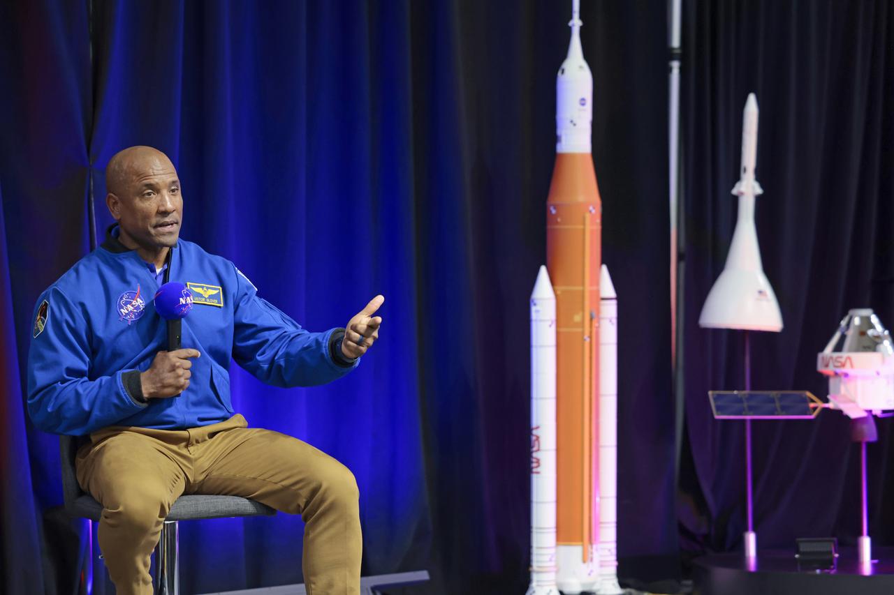 NASA astronaut Victor Glover views the core stage of the SLS (Space Launch System) rocket that will help power Artemis II at NASA’s Michoud Assembly Facility in New Orleans July 15. Glover will pilot Artemis II, the first crewed mission of NASA’s Artemis campaign. Crews moved the 212-foot-tall core stage with its four RS-25 engines to Building 110 at NASA Michoud prior to rolling it out to NASA’s Pegasus barge July 16 for delivery to NASA’s Kennedy Space Center in Florida. The core stage has two giant propellant tanks that collectively hold more than 733,000 gallons of super cold liquid propellant to feed the stage’s four RS-25 engines. Together, the engines produce more than 2 million pounds of thrust to help send astronauts inside NASA’s Orion spacecraft to venture around the Moon for Artemis II.  NASA is working to land the first woman, first person of color, and its first international partner astronaut on the Moon under Artemis. SLS is part of NASA’s backbone for deep space exploration, along with the Orion spacecraft, supporting ground systems, advanced spacesuits and rovers, the Gateway in orbit around the Moon, and commercial human landing systems. SLS is the only rocket that can send Orion, astronauts, and supplies to the Moon in a single launch.  