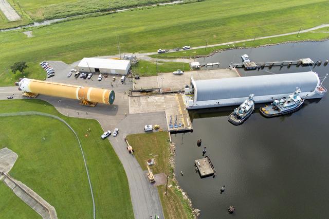 NASA image: Core Stage for Artemis II Rocket Moved to Pegasus Barge for Departure to Kennedy Space Center