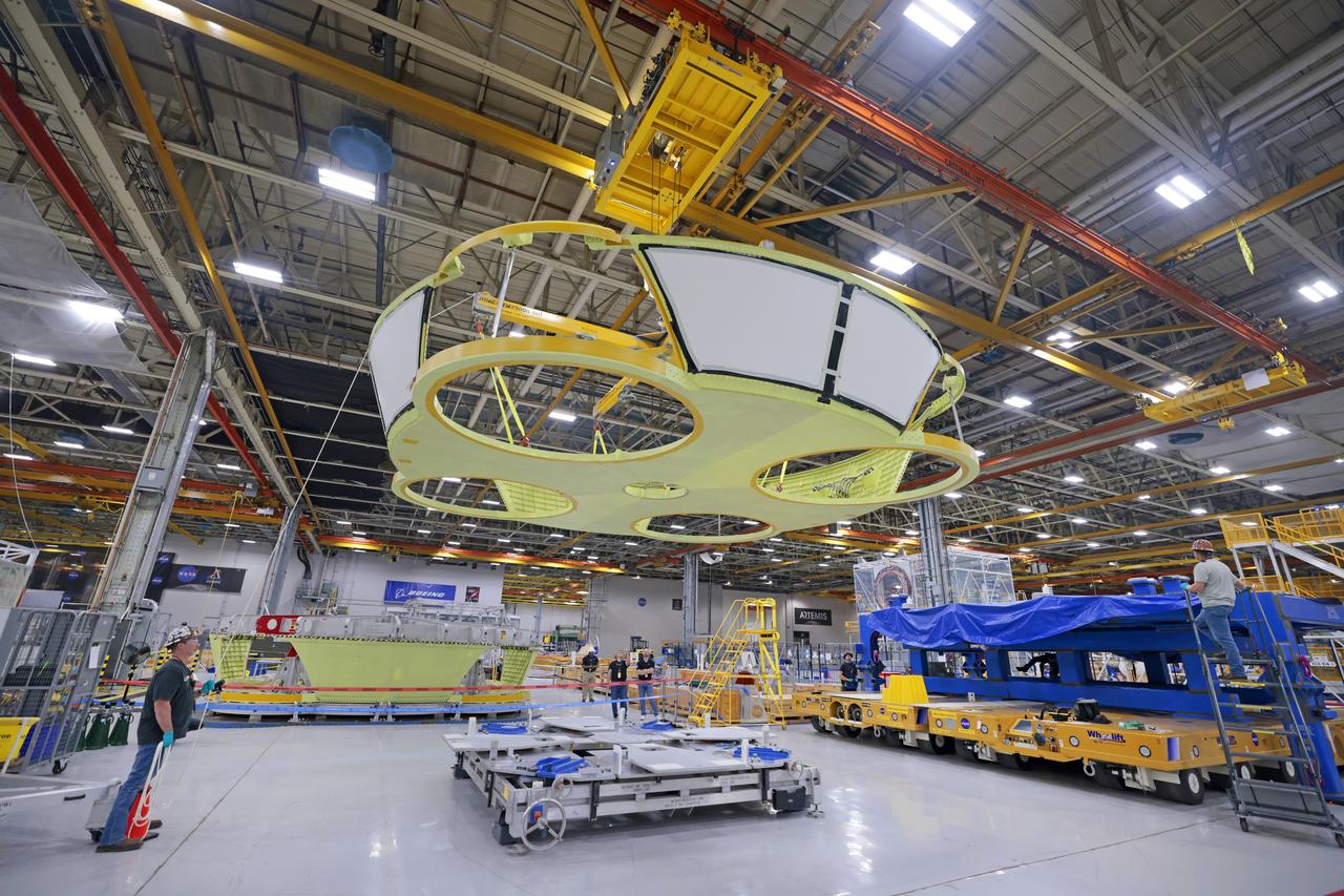 These photos show teams at NASA’s Michoud Assembly Facility in New Orleans preparing, moving, and loading the engine section boat-tail of NASA’s SLS (Space Launch System) rocket for the Artemis III mission for transportation to NASA’s Kennedy Space Center in Florida via the agency’s Pegasus barge. Inside the factory on Aug. 14 prior to the move, technicians covered the spaceflight hardware with a tarp to help protect it on its journey aboard NASA’s Pegasus barge. Crews then rolled out the hardware on Aug. 27 from the factory floor to the barge. Once in Florida, the boat-tail will be integrated with the engine section -- also manufactured at Michoud -- inside Kennedy’s Space Station Processing Facility. The engine section arrived at NASA Kennedy in Dec. 2022. Located at the bottom of the engine section, the aerodynamic boat-tail fairing channels airflow and protects the stage’s four RS-25 engines from extreme temperatures during launch. The engine section is one of five major elements that make up the 212-foot-tall rocket stage. The core stage, along with its four RS-25 engines, produce two million pounds of thrust to help launch NASA’s Orion spacecraft, astronauts, and supplies beyond Earth’s orbit and to the lunar surface for Artemis. Image credit: NASA/Michael DeMocker