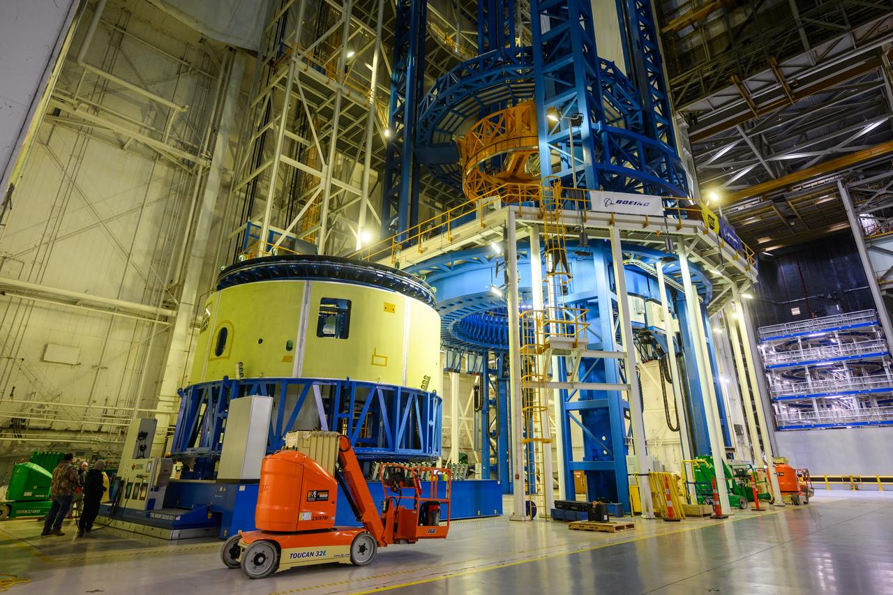 Teams at NASA’s Michoud Assembly Facility in New Orleans move the forward skirt, which will be used on the SLS (Space Launch System) rocket’s core stage for the agency’s Artemis IV mission, into the vertical assembly center on Dec. 2. Inside the tooling, the forward skirt receives its forward and aft rings through a circumferential friction-stir welding process. Seven rings are used in the production of the core stage. They provide stiffening for the dome structures on the propellant tanks and, as on the forward skirt, serve as attachment points for the major components to form the SLS core stage.    The forward skirt is one of five major elements that make up the 212-foot-tall rocket stage. The core stage, along with its four RS-25 engines, produce more than two million pounds of thrust to help launch NASA’s Orion spacecraft, astronauts, and supplies beyond Earth’s orbit and to the lunar surface for Artemis. 