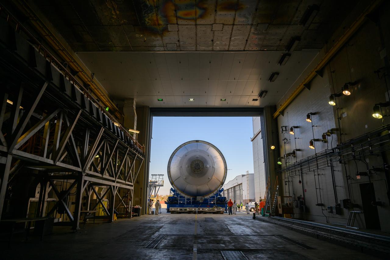 Move crews at NASA’s Michoud Assembly Facility in New Orleans  move a liquid oxygen tank for its SLS (Space Launch System) rocket from the vertical assembly building into a nearby cell on Dec. 23. The tank, which will be used on the core stage of the agency’s Artemis III mission, will be primed using an automated process in preparation for application of its thermal protection system.   The propellant tank is one of five major elements that make up the 212-foot-tall rocket stage. The core stage, along with its four RS-25 engines, produce more than two million pounds of thrust to help launch NASA’s Orion spacecraft, astronauts, and supplies beyond Earth’s orbit and to the lunar surface for Artemis.