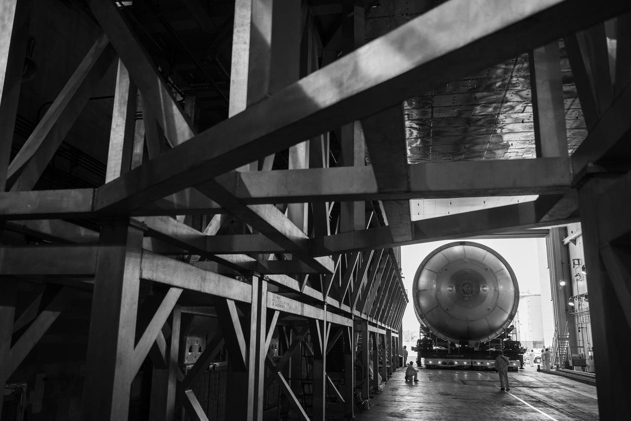 Move crews at NASA’s Michoud Assembly Facility in New Orleans  move a liquid oxygen tank for its SLS (Space Launch System) rocket from the vertical assembly building into a nearby cell on Dec. 23. The tank, which will be used on the core stage of the agency’s Artemis III mission, will be primed using an automated process in preparation for application of its thermal protection system.   The propellant tank is one of five major elements that make up the 212-foot-tall rocket stage. The core stage, along with its four RS-25 engines, produce more than two million pounds of thrust to help launch NASA’s Orion spacecraft, astronauts, and supplies beyond Earth’s orbit and to the lunar surface for Artemis.