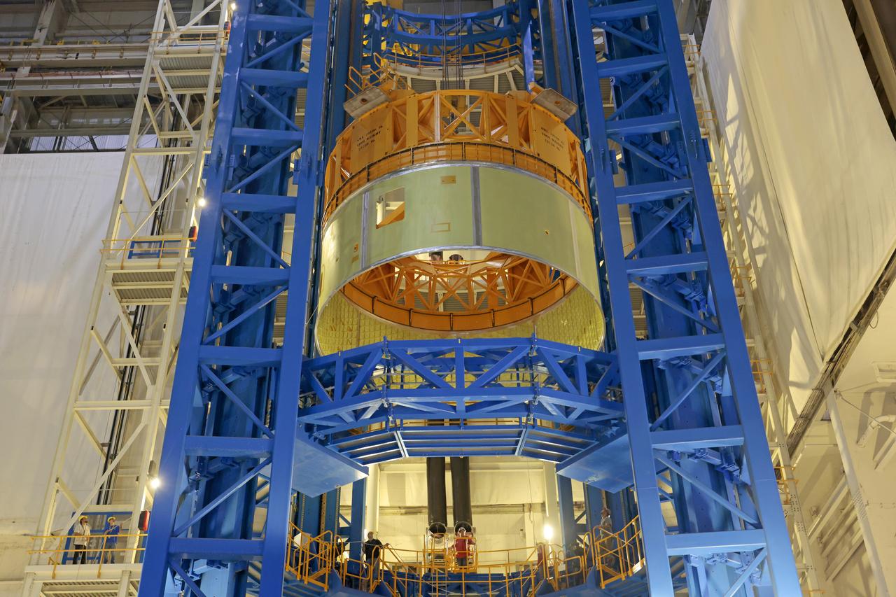 This image shows teams at NASA’s Michoud Assembly Facility in New Orleans lifting a forward skirt out of its vertical assembly center on Jan. 31, 2025. The forward skirt, which will be used on the core stage for the agency’s SLS (Space Launch System) rocket for its Artemis IV mission, houses flight computers, cameras, and avionics. While inside the vertical assembly center, technicians attached the forward skirt’s forward and aft rings, which serve as attachments points to the launch vehicle stage adapter and the liquid oxygen tank, respectively. The forward skirt is one of five major elements that make up the 212-foot-tall rocket stage. The core stage, along with its four RS-25 engines, produce more than two million pounds of thrust to help launch NASA’s Orion spacecraft, astronauts, and supplies beyond Earth’s orbit and to the lunar surface for Artemis.  Image credit: NASA/Michael DeMocker