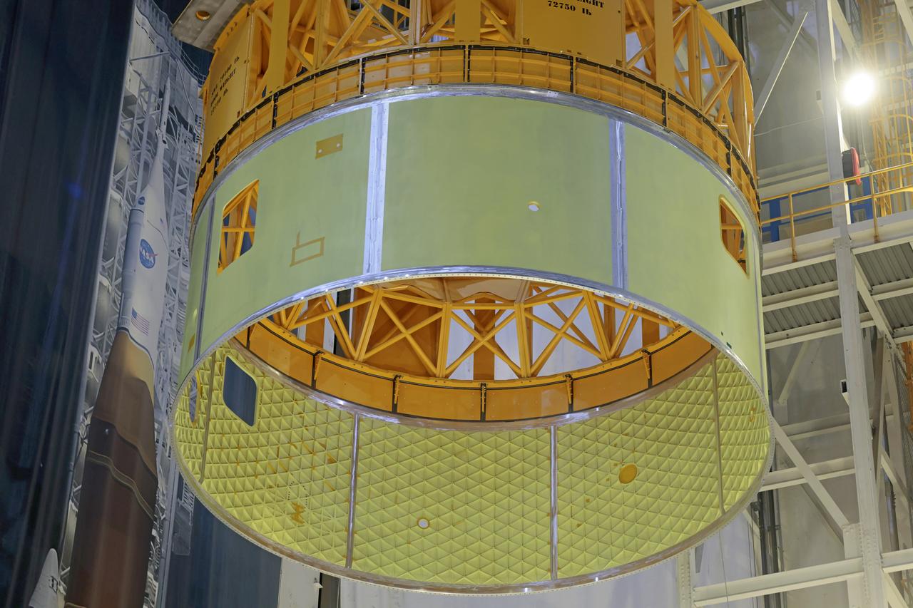 This image shows teams at NASA’s Michoud Assembly Facility in New Orleans lifting a forward skirt out of its vertical assembly center on Jan. 31, 2025. The forward skirt, which will be used on the core stage for the agency’s SLS (Space Launch System) rocket for its Artemis IV mission, houses flight computers, cameras, and avionics. While inside the vertical assembly center, technicians attached the forward skirt’s forward and aft rings, which serve as attachments points to the launch vehicle stage adapter and the liquid oxygen tank, respectively. The forward skirt is one of five major elements that make up the 212-foot-tall rocket stage. The core stage, along with its four RS-25 engines, produce more than two million pounds of thrust to help launch NASA’s Orion spacecraft, astronauts, and supplies beyond Earth’s orbit and to the lunar surface for Artemis.  Image credit: NASA/Michael DeMocker