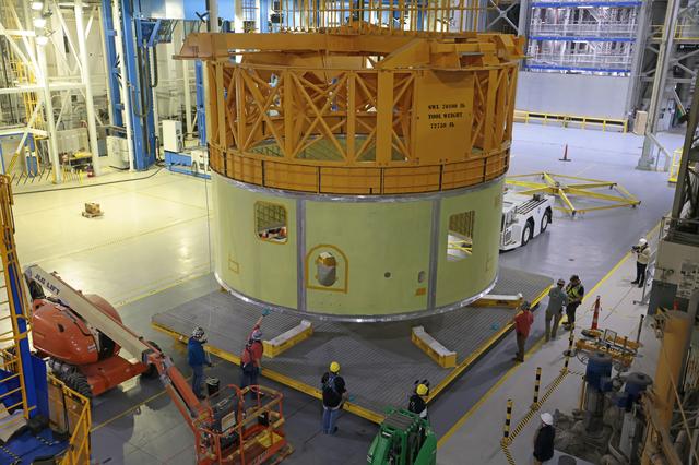 NASA image: Structurally Complete Forward Skirt Lifts Out of Vertical Assembly Center