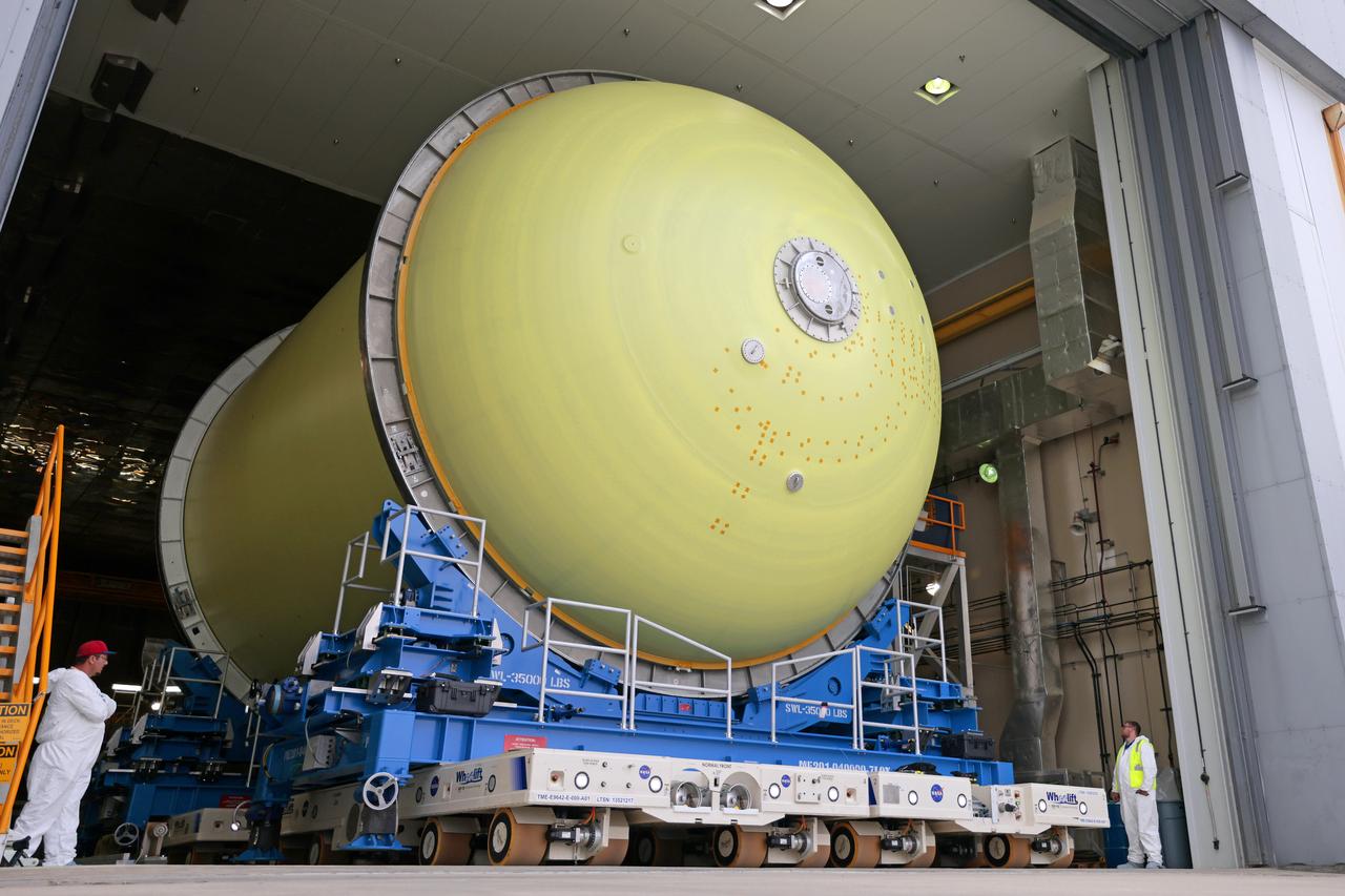 Move Crews at NASA’s Michoud Assembly Facility in New Orleans transport a liquid oxygen tank from a detached production building to the main 43-acre rocket factory on Mar. 26. Teams recently completed primer application on the tank, which will be used on the core stage of the agency’s SLS (Space Launch System) rocket for its Artemis III mission. The tank will now undergo electrical installations before moving on to the next phase of production. The propellant tank is one of five major elements that make up the 212-foot-tall rocket stage. The core stage, along with its four RS-25 engines, produce more than two million pounds of thrust to help launch NASA’s Orion spacecraft, astronauts, and supplies beyond Earth’s orbit and to the lunar surface for Artemis.    