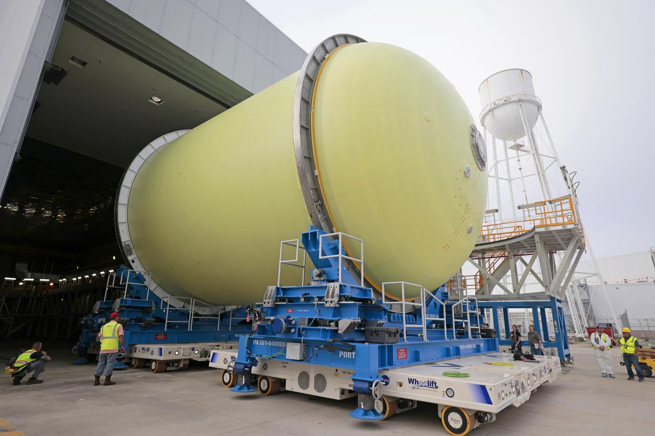 Move Crews at NASA’s Michoud Assembly Facility in New Orleans transport a liquid oxygen tank from a detached production building to the main 43-acre rocket factory on Mar. 26. Teams recently completed primer application on the tank, which will be used on the core stage of the agency’s SLS (Space Launch System) rocket for its Artemis III mission. The tank will now undergo electrical installations before moving on to the next phase of production. The propellant tank is one of five major elements that make up the 212-foot-tall rocket stage. The core stage, along with its four RS-25 engines, produce more than two million pounds of thrust to help launch NASA’s Orion spacecraft, astronauts, and supplies beyond Earth’s orbit and to the lunar surface for Artemis.     