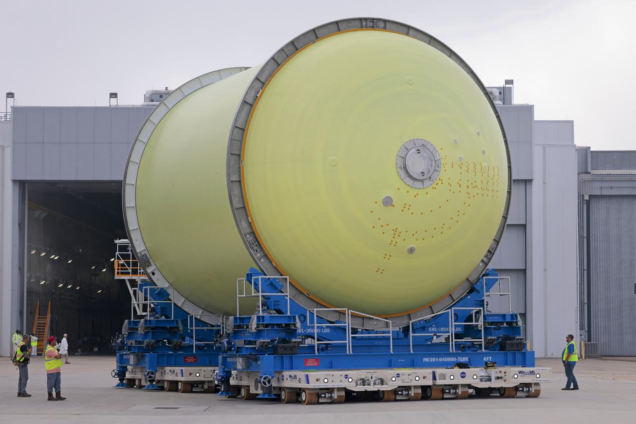 Move Crews at NASA’s Michoud Assembly Facility in New Orleans transport a liquid oxygen tank from a detached production building to the main 43-acre rocket factory on Mar. 26. Teams recently completed primer application on the tank, which will be used on the core stage of the agency’s SLS (Space Launch System) rocket for its Artemis III mission. The tank will now undergo electrical installations before moving on to the next phase of production. The propellant tank is one of five major elements that make up the 212-foot-tall rocket stage. The core stage, along with its four RS-25 engines, produce more than two million pounds of thrust to help launch NASA’s Orion spacecraft, astronauts, and supplies beyond Earth’s orbit and to the lunar surface for Artemis.