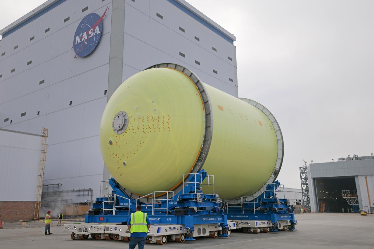Move Crews at NASA’s Michoud Assembly Facility in New Orleans transport a liquid oxygen tank from a detached production building to the main 43-acre rocket factory on Mar. 26. Teams recently completed primer application on the tank, which will be used on the core stage of the agency’s SLS (Space Launch System) rocket for its Artemis III mission. The tank will now undergo electrical installations before moving on to the next phase of production. The propellant tank is one of five major elements that make up the 212-foot-tall rocket stage. The core stage, along with its four RS-25 engines, produce more than two million pounds of thrust to help launch NASA’s Orion spacecraft, astronauts, and supplies beyond Earth’s orbit and to the lunar surface for Artemis.