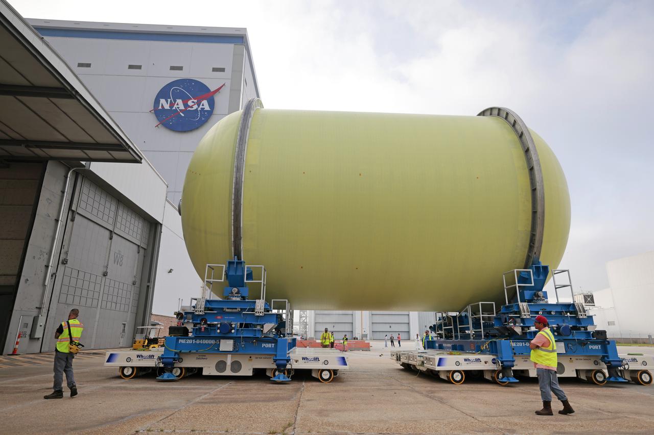 Move Crews at NASA’s Michoud Assembly Facility in New Orleans transport a liquid oxygen tank from a detached production building to the main 43-acre rocket factory on Mar. 26. Teams recently completed primer application on the tank, which will be used on the core stage of the agency’s SLS (Space Launch System) rocket for its Artemis III mission. The tank will now undergo electrical installations before moving on to the next phase of production. The propellant tank is one of five major elements that make up the 212-foot-tall rocket stage. The core stage, along with its four RS-25 engines, produce more than two million pounds of thrust to help launch NASA’s Orion spacecraft, astronauts, and supplies beyond Earth’s orbit and to the lunar surface for Artemis.