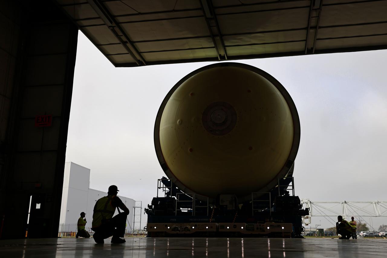 Move Crews at NASA’s Michoud Assembly Facility in New Orleans transport a liquid oxygen tank from a detached production building to the main 43-acre rocket factory on Mar. 26. Teams recently completed primer application on the tank, which will be used on the core stage of the agency’s SLS (Space Launch System) rocket for its Artemis III mission. The tank will now undergo electrical installations before moving on to the next phase of production. The propellant tank is one of five major elements that make up the 212-foot-tall rocket stage. The core stage, along with its four RS-25 engines, produce more than two million pounds of thrust to help launch NASA’s Orion spacecraft, astronauts, and supplies beyond Earth’s orbit and to the lunar surface for Artemis.